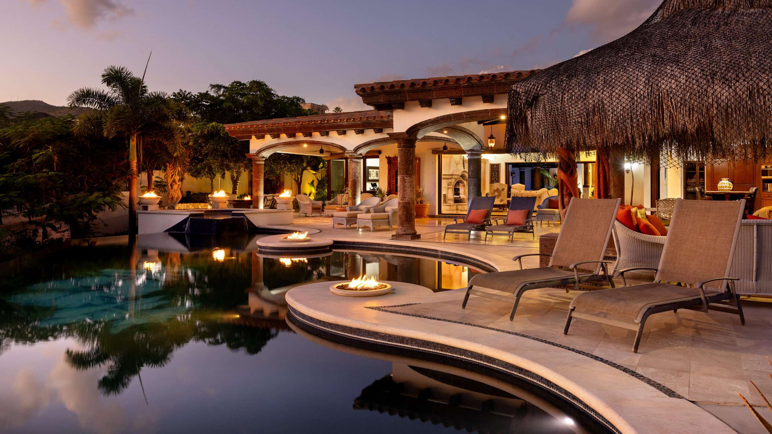 Cove Club Las Posadas Introducing Villa de Paz, an exceptional single-level estate nestled within the iconic, guard-gated community of Cabo del Sol, a prestigious master-planned enclave now entering its most exclusive era. Framed by dramatic golf-course vistas and the soft shimmer of the Sea of Cortez, this residence blends timeless hacienda architecture with sophisticated design and an effortless indoor-outdoor flow that defines the finest homes in Los Cabos.From the moment you step inside, the home reveals a warm yet elegant ambiance. Grand, naturally lit living spaces with high ceilings and artisan finishes open seamlessly through expansive sliding glass doors, inviting the outdoors in and creating a lifestyle of breezy, sun-filled ease. The open-concept living, dining, and gourmet kitchen serve as the heart of the homeperfect for quiet mornings, family gatherings, and elevated entertaining alike.The villa offers multiple spacious en-suite bedrooms, thoughtfully positioned for privacy and comfort, along with a versatile TV/guest suite ideal for extended family or visiting friends. Every room feels intentional, serene, and connected to the home's calming energy.Outdoors, Villa de Paz becomes a private resort. The expansive terrace features a sparkling pool and spa, shaded lounging areas, and multiple fire pits strategically placed to create intimate spaces for sunset – Cabo Del Sol, Cabo Corridor, BS